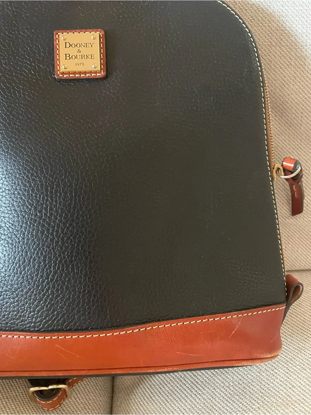 Dooney & Bourke Black with Brown Trim Leather Backpack